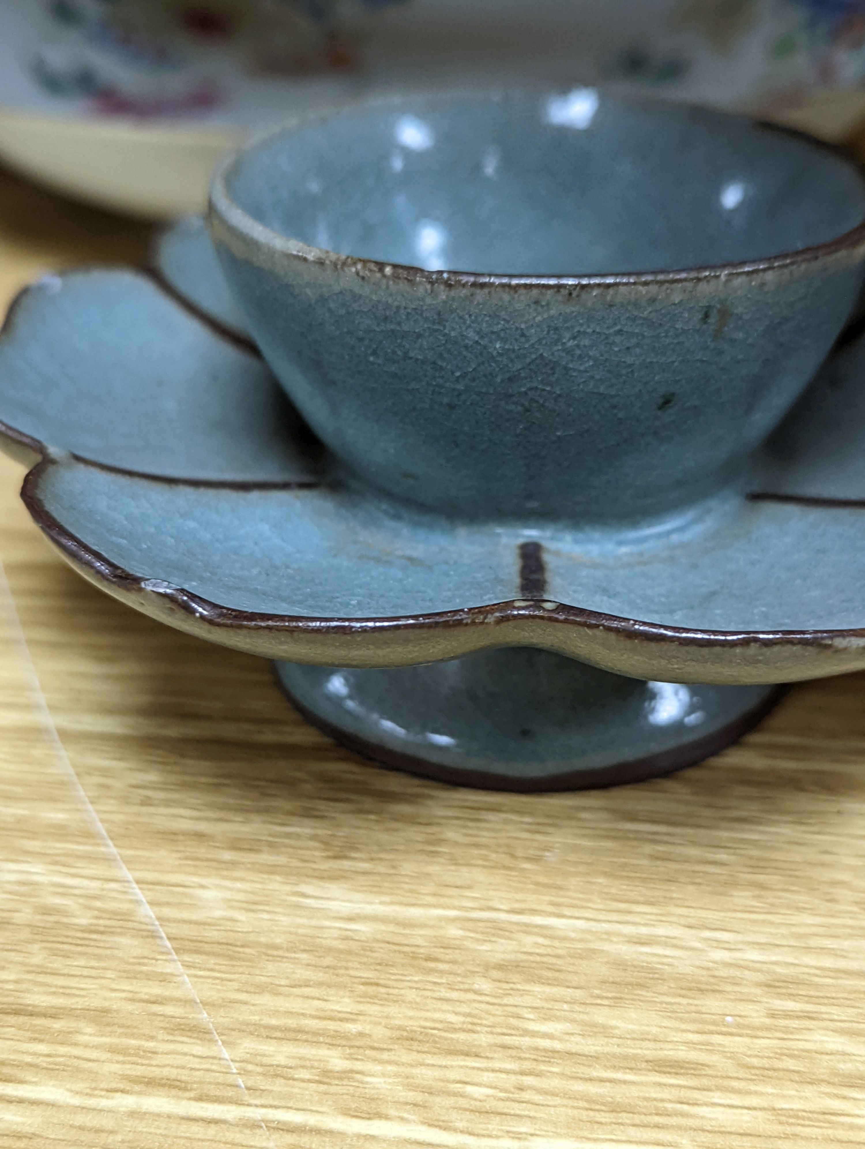 An 18th century Chinese famille rose dish, crackle-glaze stem cup, Beijing glass tea bowl and a Chinese Imari plate. Largest 24cm